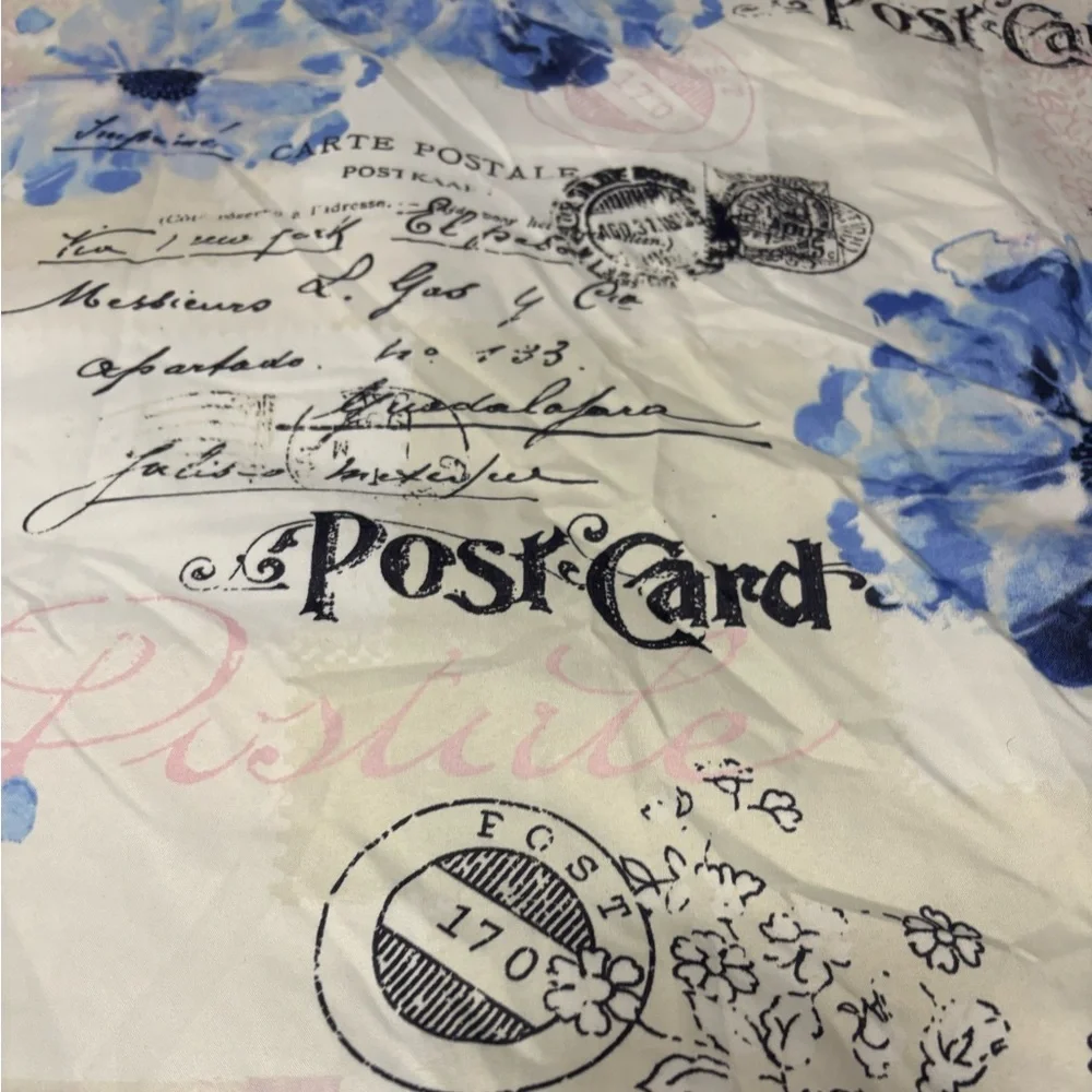 King size comforter with Paris details in pink and blue.